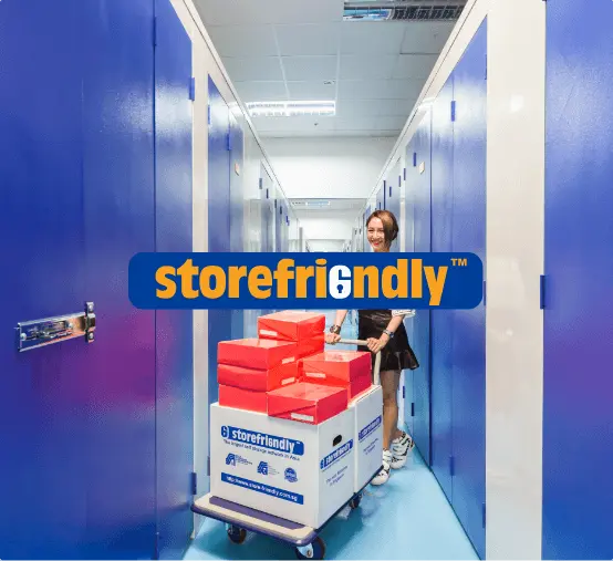 StoreFriendly@2x woman packing storefriendly storage unit