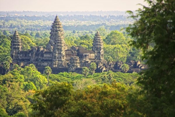 the temples of ankor wat in the middle of a forest