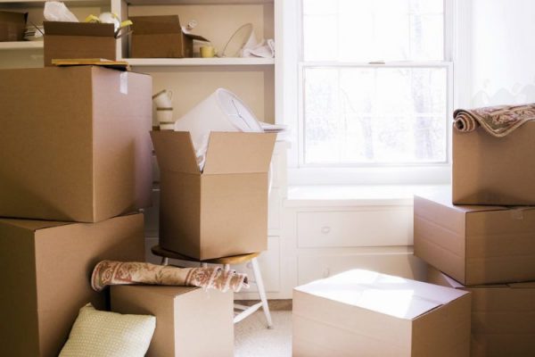 boxes placed in the living room for moving