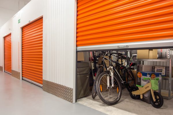 bikes stored in an orange storage unit