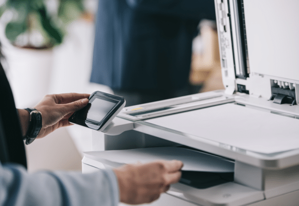 a person using the office printer