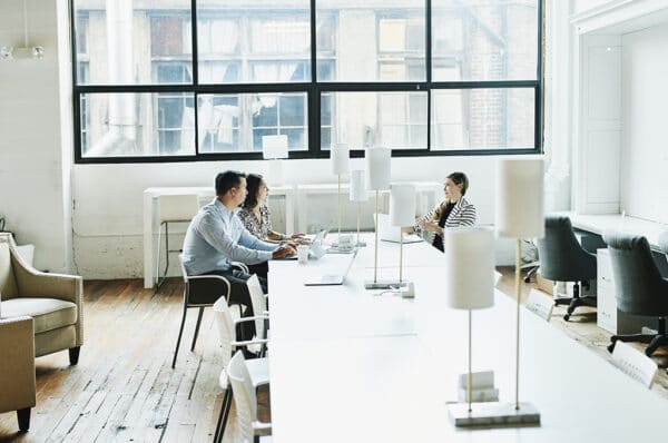 business colleagues having project meeting in coworking office
