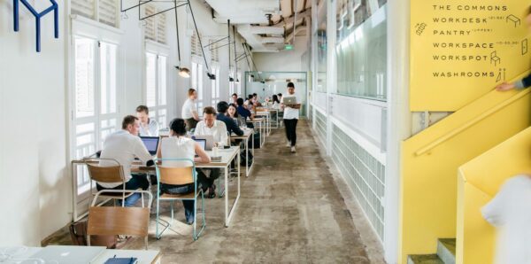 people working in a shared co-working space