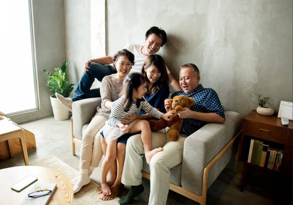 Family enjoying a comfortable living space with storage space rental solutions in Singapore